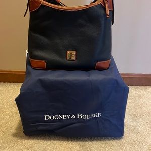 Dooney & Bourke medium size pebbled leather hobo shoulder bag.